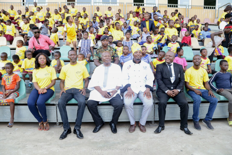 Dr. Kwame Amoako Tuffour (center left) and Elijah Amoo Addo (center right) at Food for All Africa’s Blue Band Nutrition4All Feast Day,
